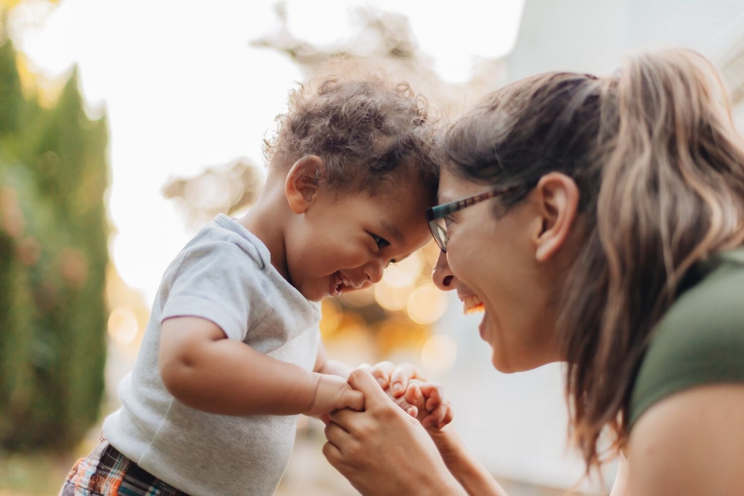 Mum And Child Head Touching